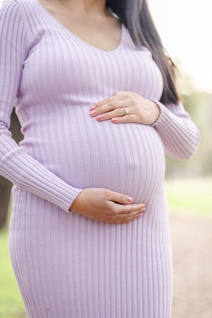 Pregnant mama holds her baby belly during a maternity photoshooot in Bay Area